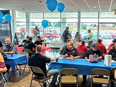 People enjoying food at indoor event